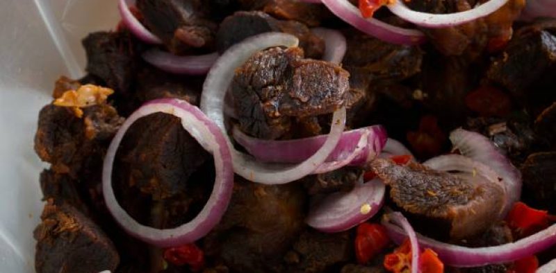 It is a snack in Nigeria. It is made with boiled, then,deep fried beef, pepper and onions. It can be a stand-alone meal or a dessert or a form of appetizer.